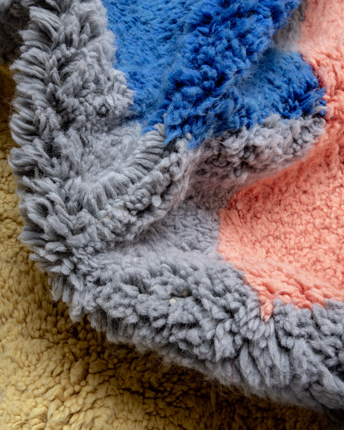 Modern, designer, handcrafted Berber rug from Morocco. Beniourain carpet with beautiful colours and patterns and fluffy wool texture.